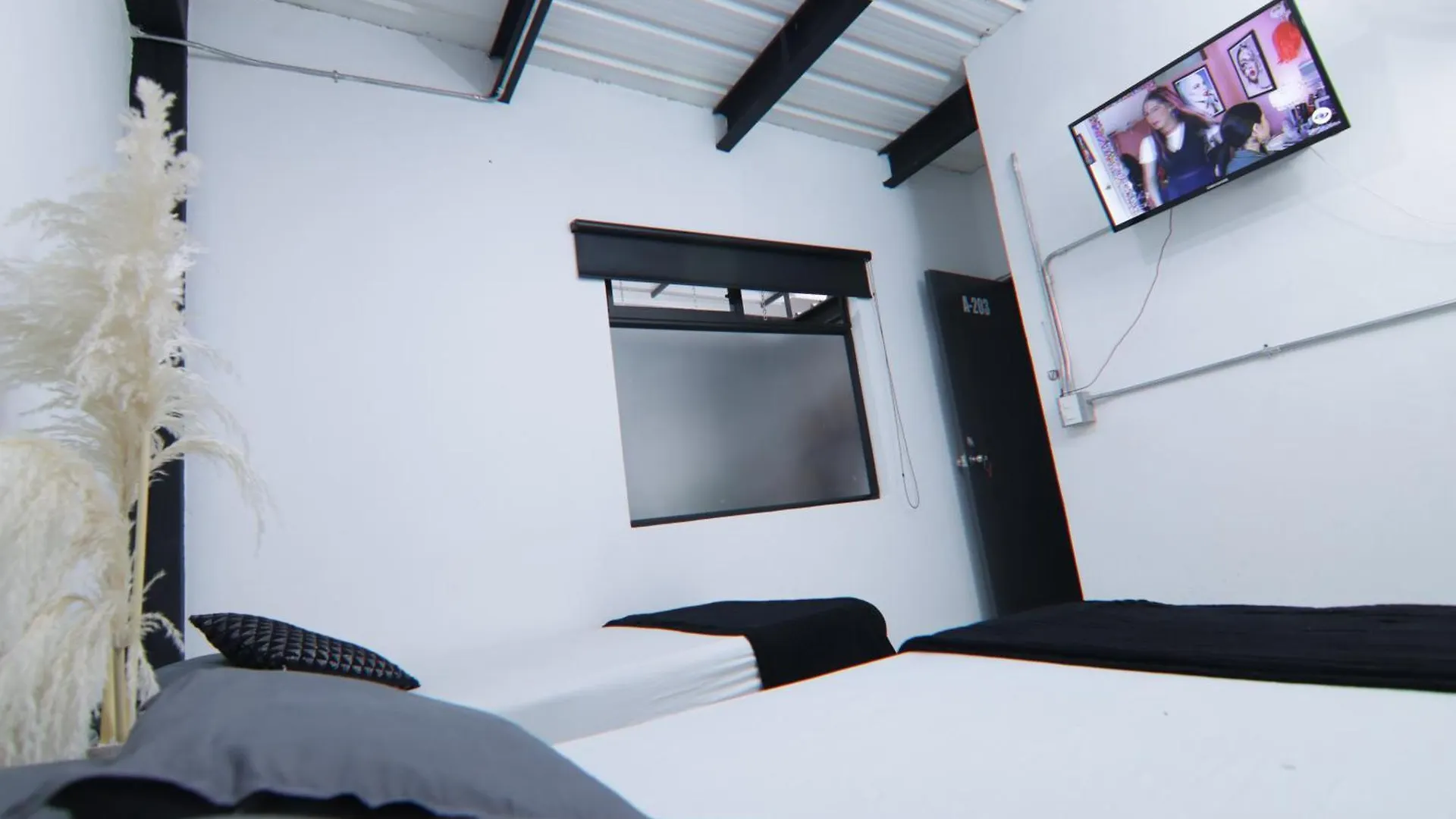 Hotel Casa Laureles Malibu Medellín